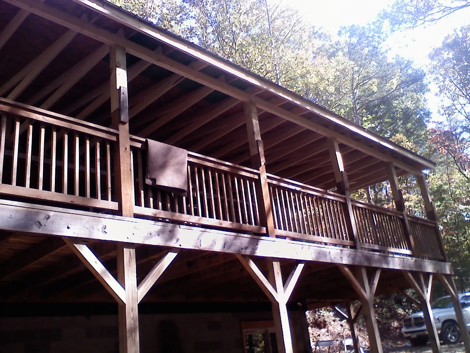 Timber framing under a new elevated porch and deck — Roof Leak Repair in Muldrow by Roofing Brothers